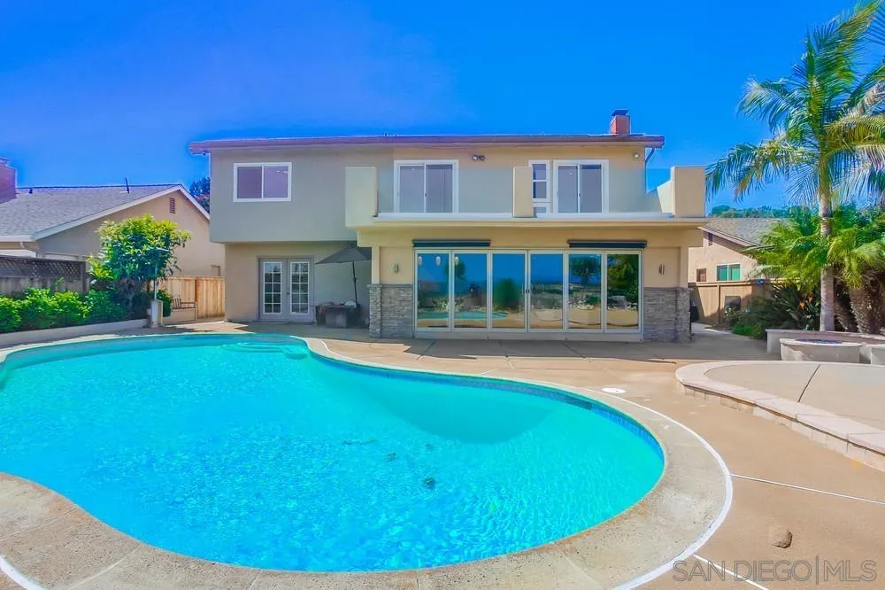 13495 Mango Drive Del Mar, CA 92014 - Photo 49 of 53 a view of a house with swimming pool