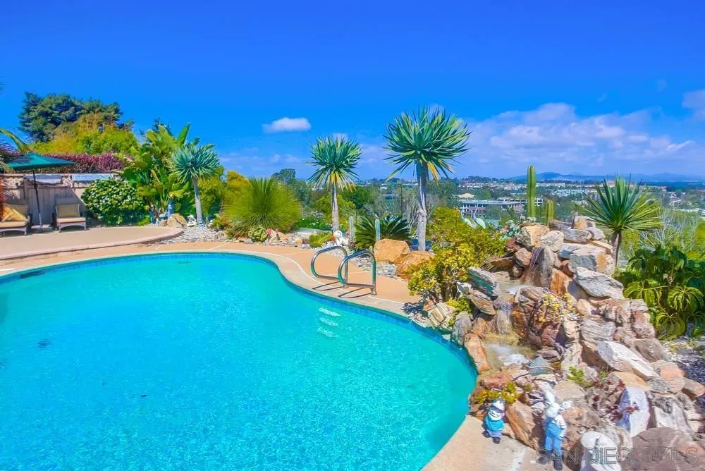 13495 Mango Drive Del Mar, CA 92014 - Photo 52 of 53 a view of a swimming pool with a yard