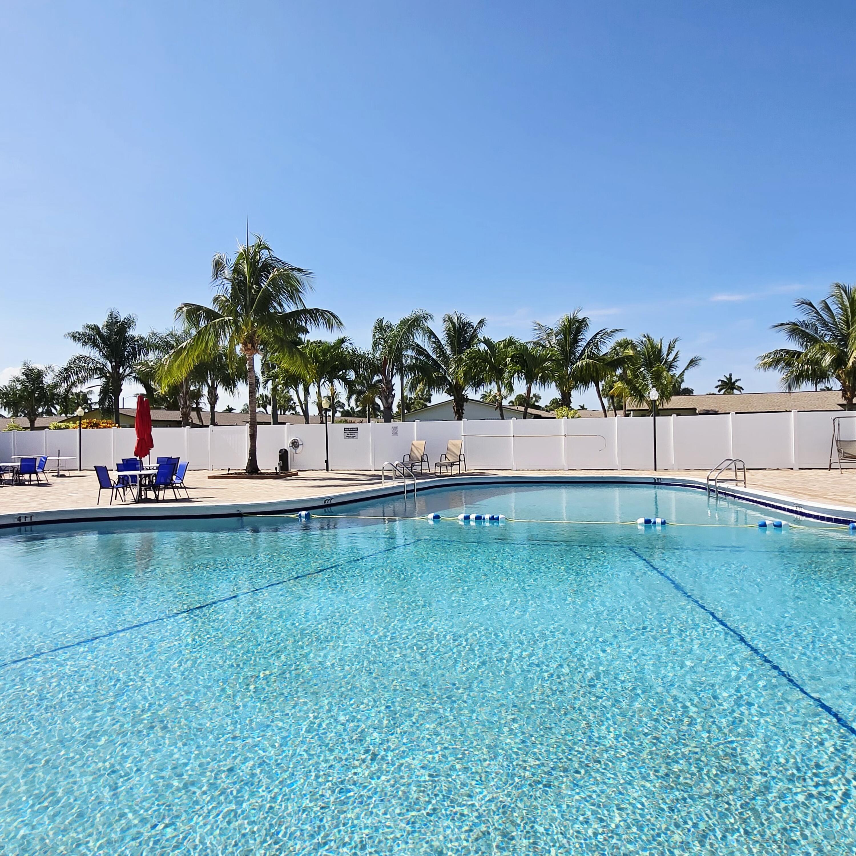 2930 Crosley Drive East, Unit C West Palm Beach, FL 33415 - Photo 15 of 21 a view of a backyard