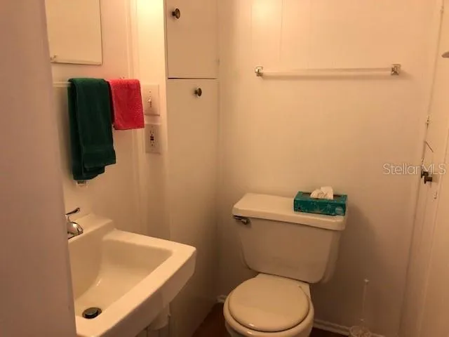 a bathroom with a sink and a toilet