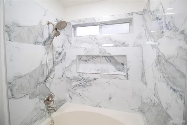 a bathroom with a bathtub