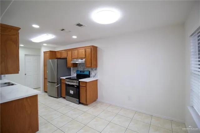a living room with washer and dryer