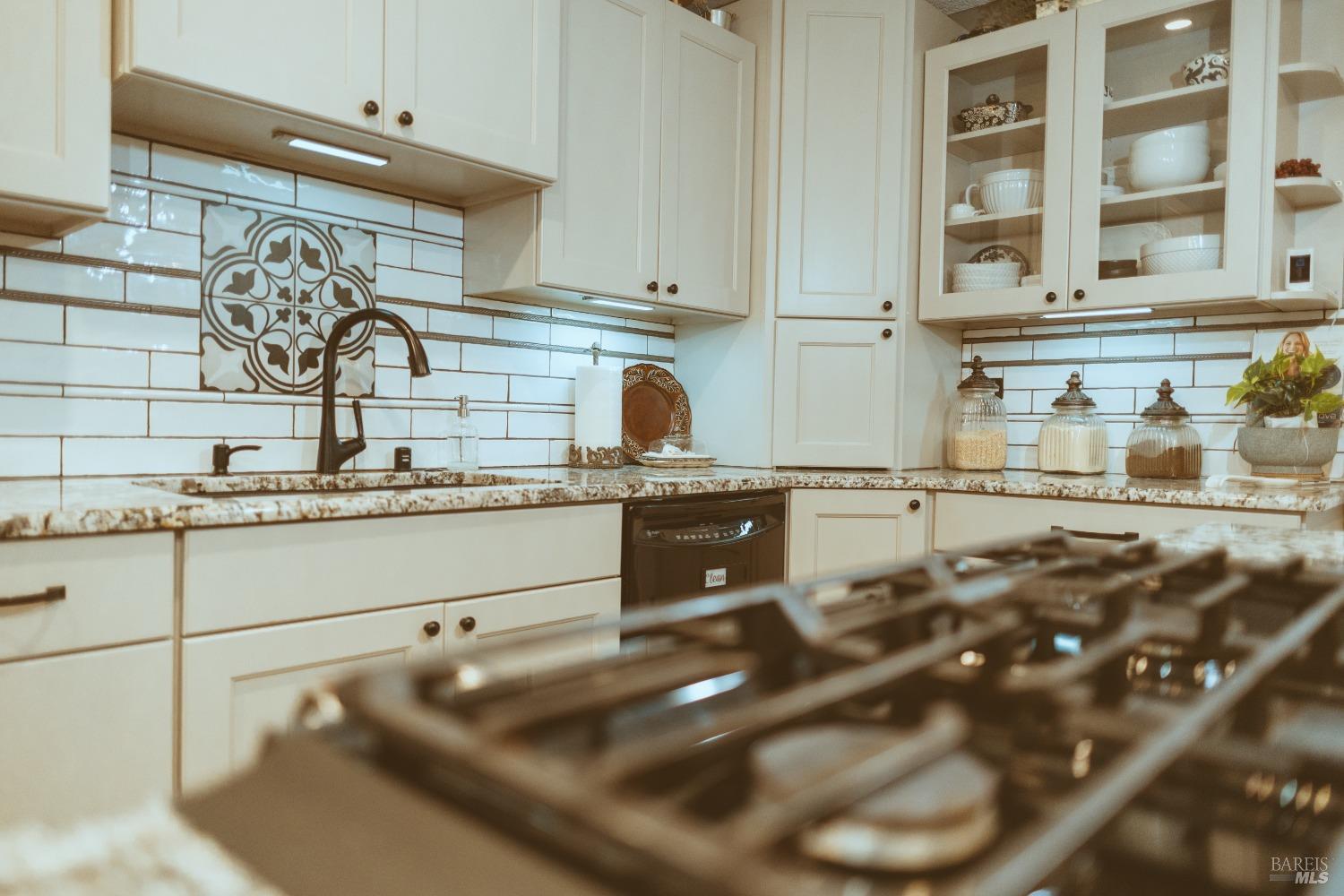Undisclosed Address Rohnert Park, CA 94928 - Photo 13 of 41 a kitchen with a sink and cabinets