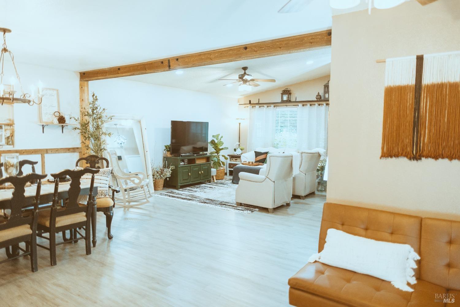Undisclosed Address Rohnert Park, CA 94928 - Photo 17 of 41 a living room with furniture and a flat screen tv