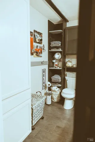 a bed room with a bed and a mirror