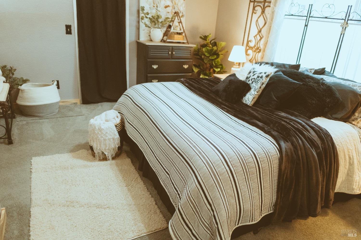 Undisclosed Address Rohnert Park, CA 94928 - Photo 26 of 41 a bedroom with a bed and window