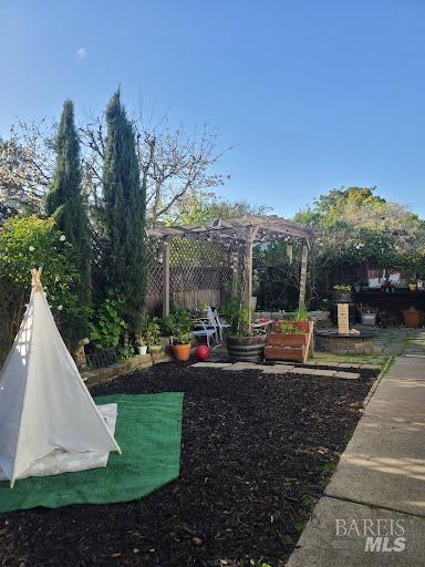 Undisclosed Address Rohnert Park, CA 94928 - Photo 34 of 41 a view of a house with backyard sitting area and garden