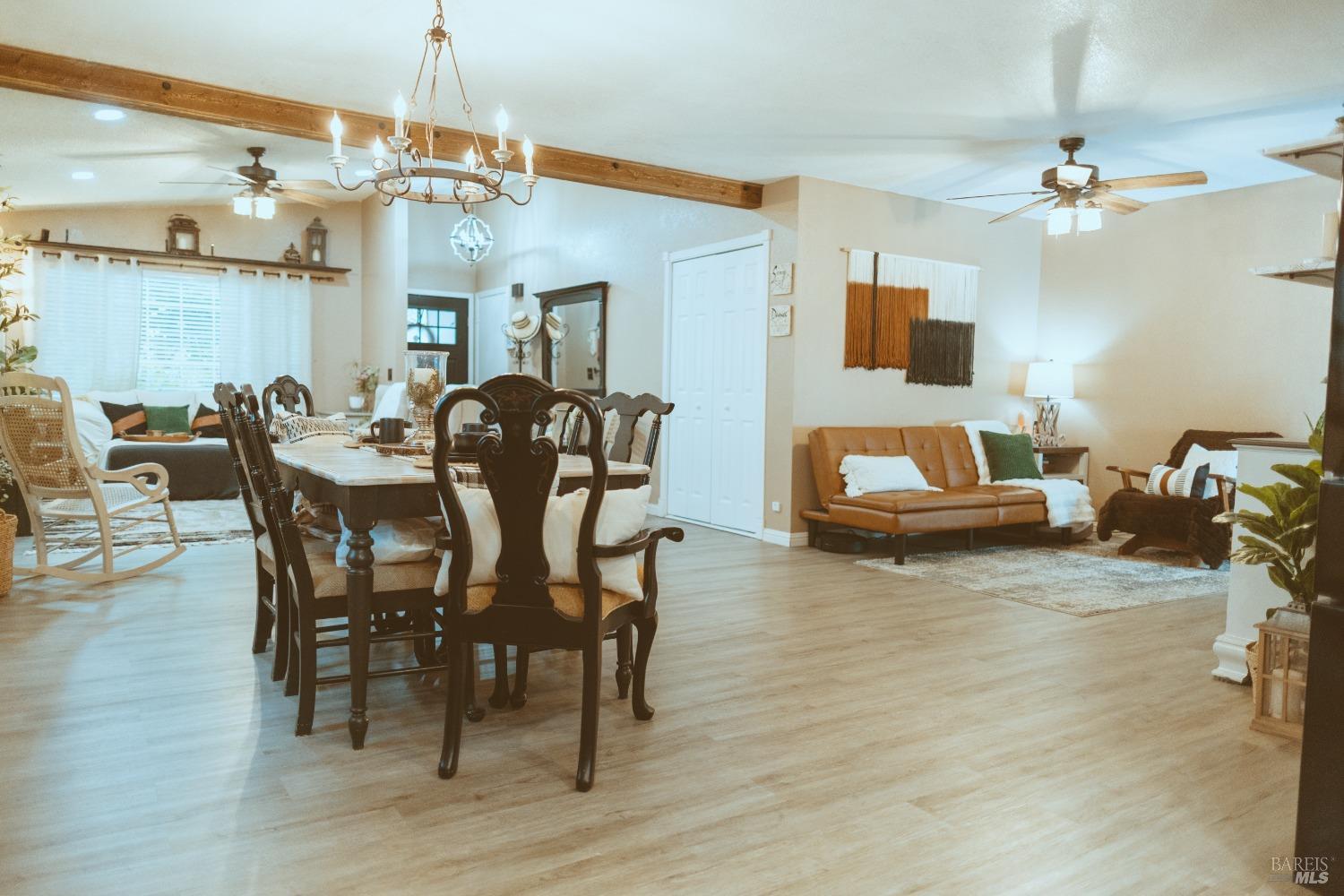 Undisclosed Address Rohnert Park, CA 94928 - Photo 7 of 41 a view of a dining room with furniture and chandelier