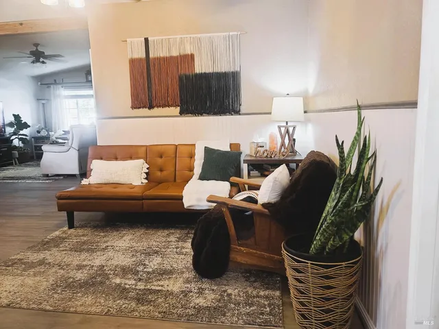 a living room with furniture and a couch