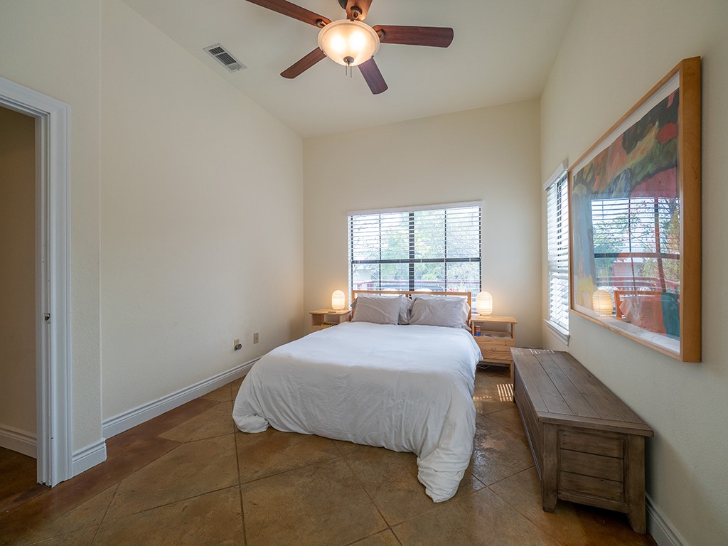 3609 Clawson Road, Unit B Austin, TX 78704 - Photo 20 of 28 Room with vaulted ceilings and wood-finish ceiling fan with integrated lighting