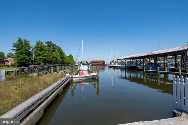 an outdoor space with furniture and umbrella