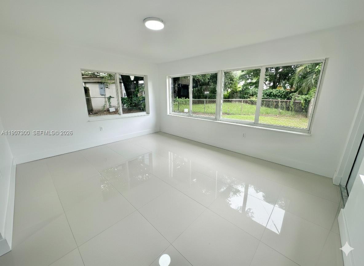 5740 Freedom Street Hollywood, FL 33021 - Photo 17 of 43 a view of livingroom and window
