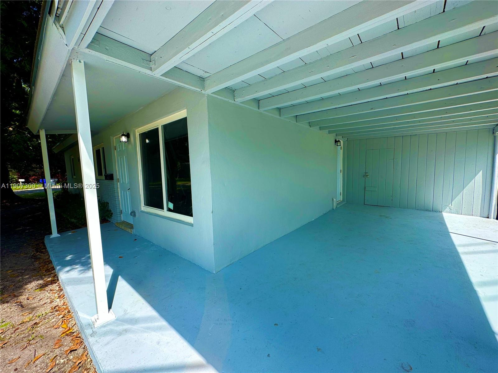 5740 Freedom Street Hollywood, FL 33021 - Photo 2 of 44 a view of a porch