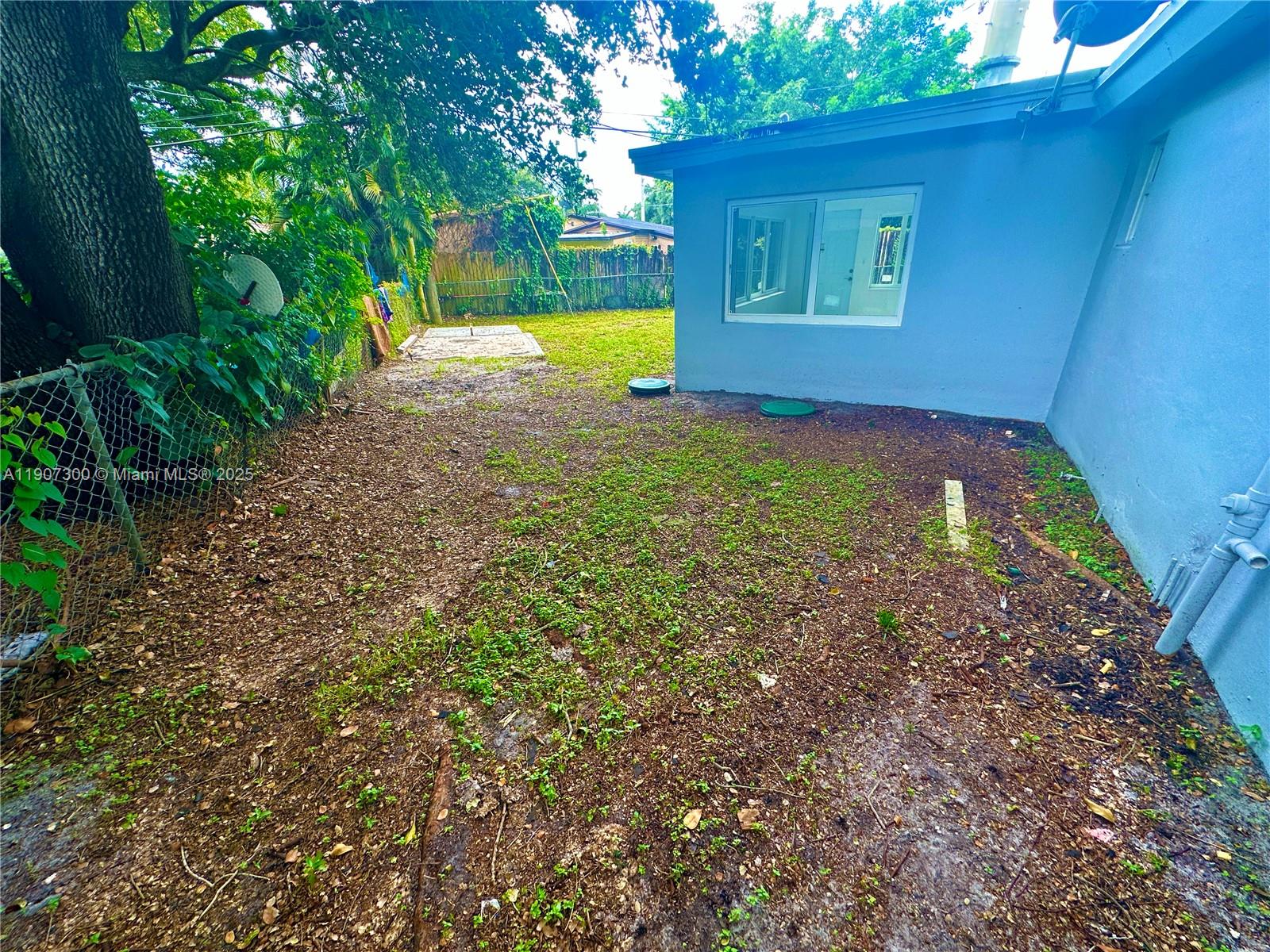 5740 Freedom Street Hollywood, FL 33021 - Photo 33 of 44 a view of an outdoor space and yard