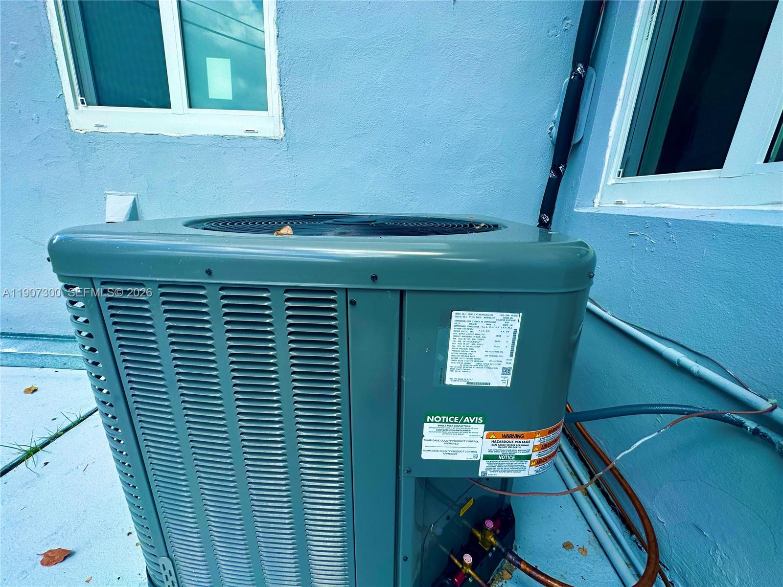 5740 Freedom Street Hollywood, FL 33021 - Photo 42 of 43 a bathroom with a sink and a mirror