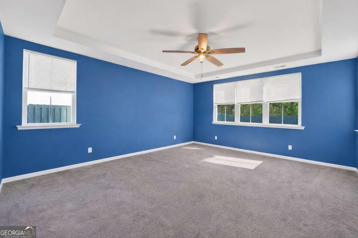 369 Waybridge Way Richmond Hill, GA 31324 - Photo 33 of 40 a view of an empty room with a window
