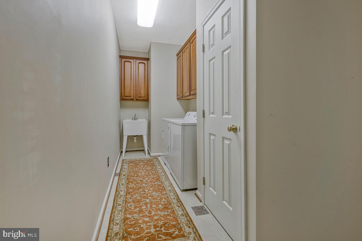 1117 Horizon View Place Accokeek, MD 20607 - Photo 10 of 59 Bright and inviting laundry hallway.