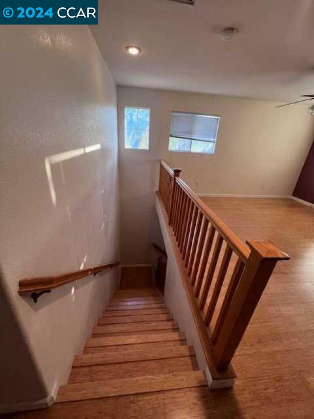 29160 Whitegate Lane Highland, CA 92346 - Photo 13 of 27 a view of entryway and hall with wooden floor