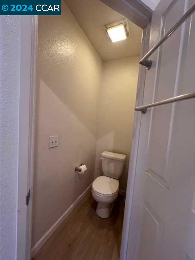 29160 Whitegate Lane Highland, CA 92346 - Photo 24 of 27 a bathroom with a toilet and a shower