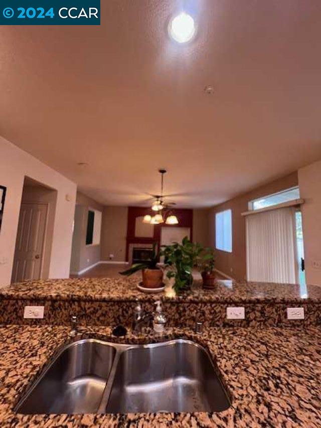 29160 Whitegate Lane Highland, CA 92346 - Photo 7 of 27 a kitchen with a sink and a stove top oven