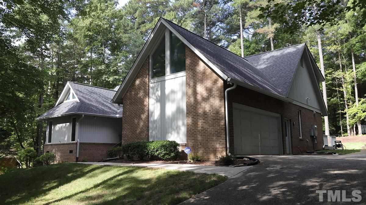 8837 Woodyhill Road Raleigh, NC 27613 - Photo 1 of 26