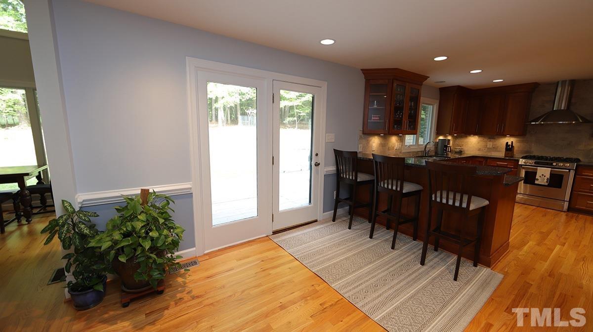 8837 Woodyhill Road Raleigh, NC 27613 - Photo 12 of 26 Kitchen bar view