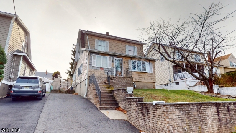 a view of a house with a back yard
