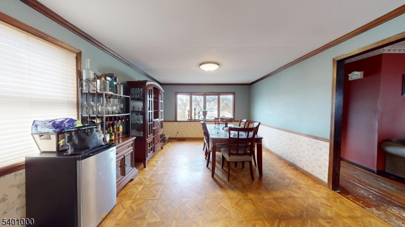 237 Winfield Terrace Union, NJ 07083 - Photo 5 of 21 a dining room with furniture and a floor to ceiling window