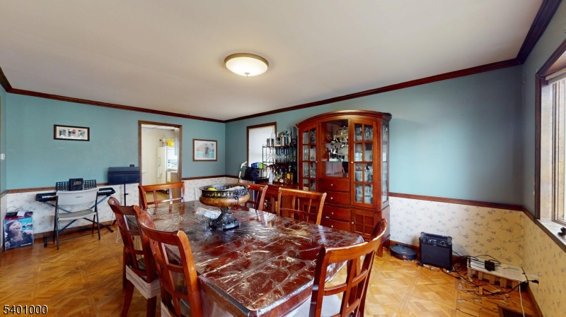 237 Winfield Terrace Union, NJ 07083 - Photo 6 of 21 a living room with dining room and wooden floor