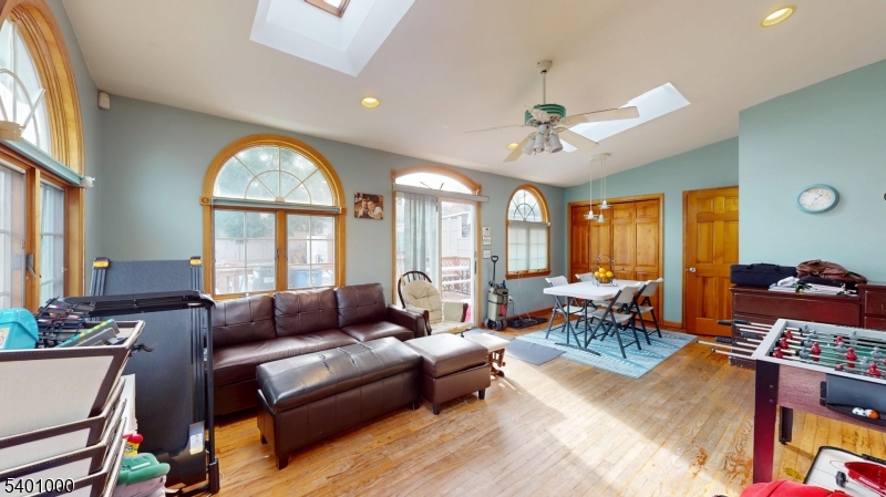 237 Winfield Terrace Union, NJ 07083 - Photo 8 of 21 a living room with furniture and a large window