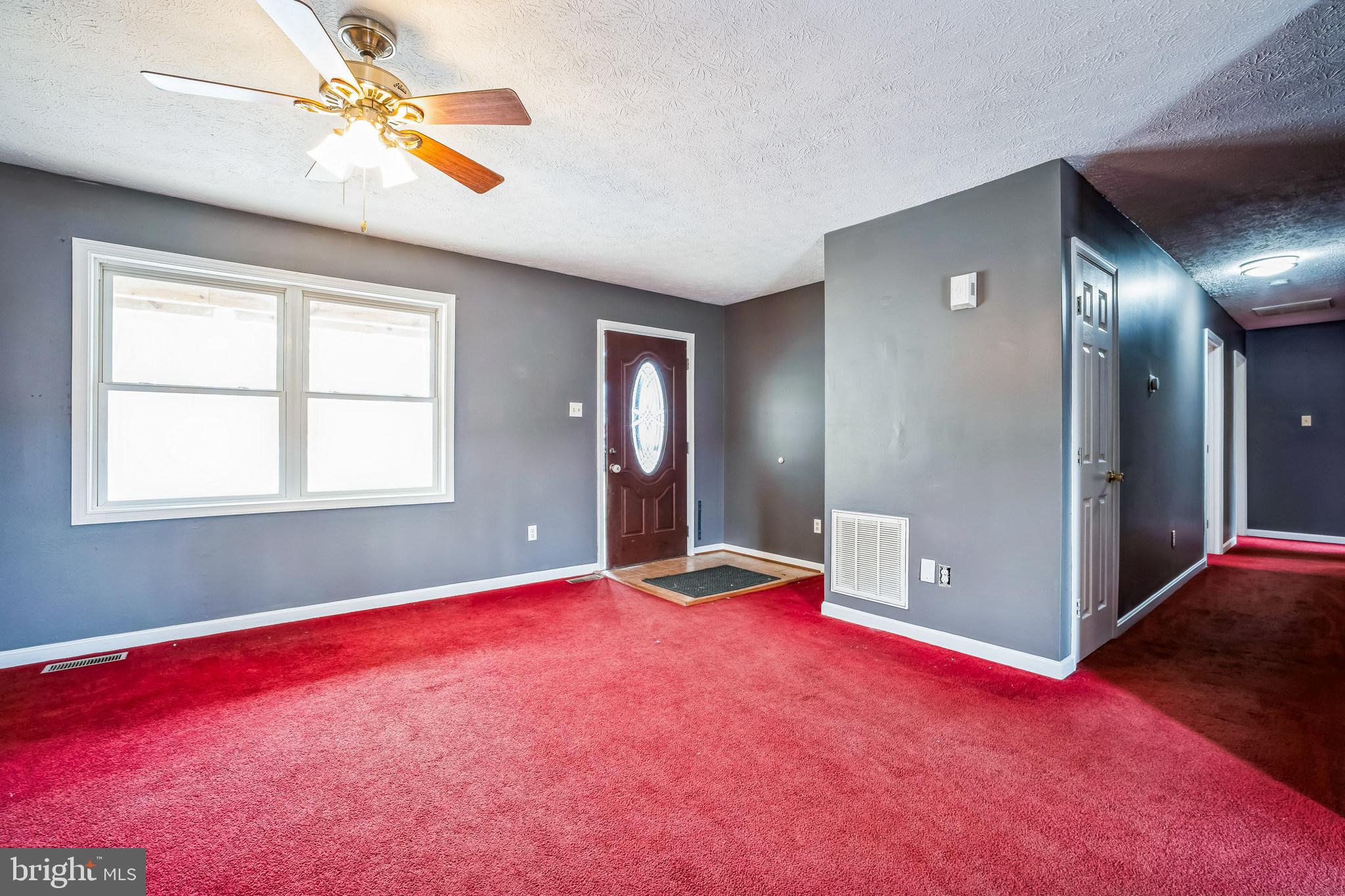 1270 High Top Road Linden, VA 22642 - Photo 4 of 30 a view of empty room with window and ceiling fan