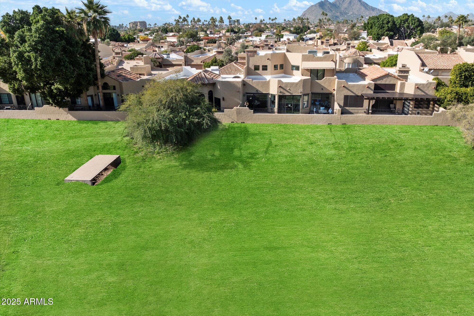 7955 East Chaparral Road, Unit 17 Scottsdale, AZ 85250 - Photo 52 of 57 Greenbelt views behind the home