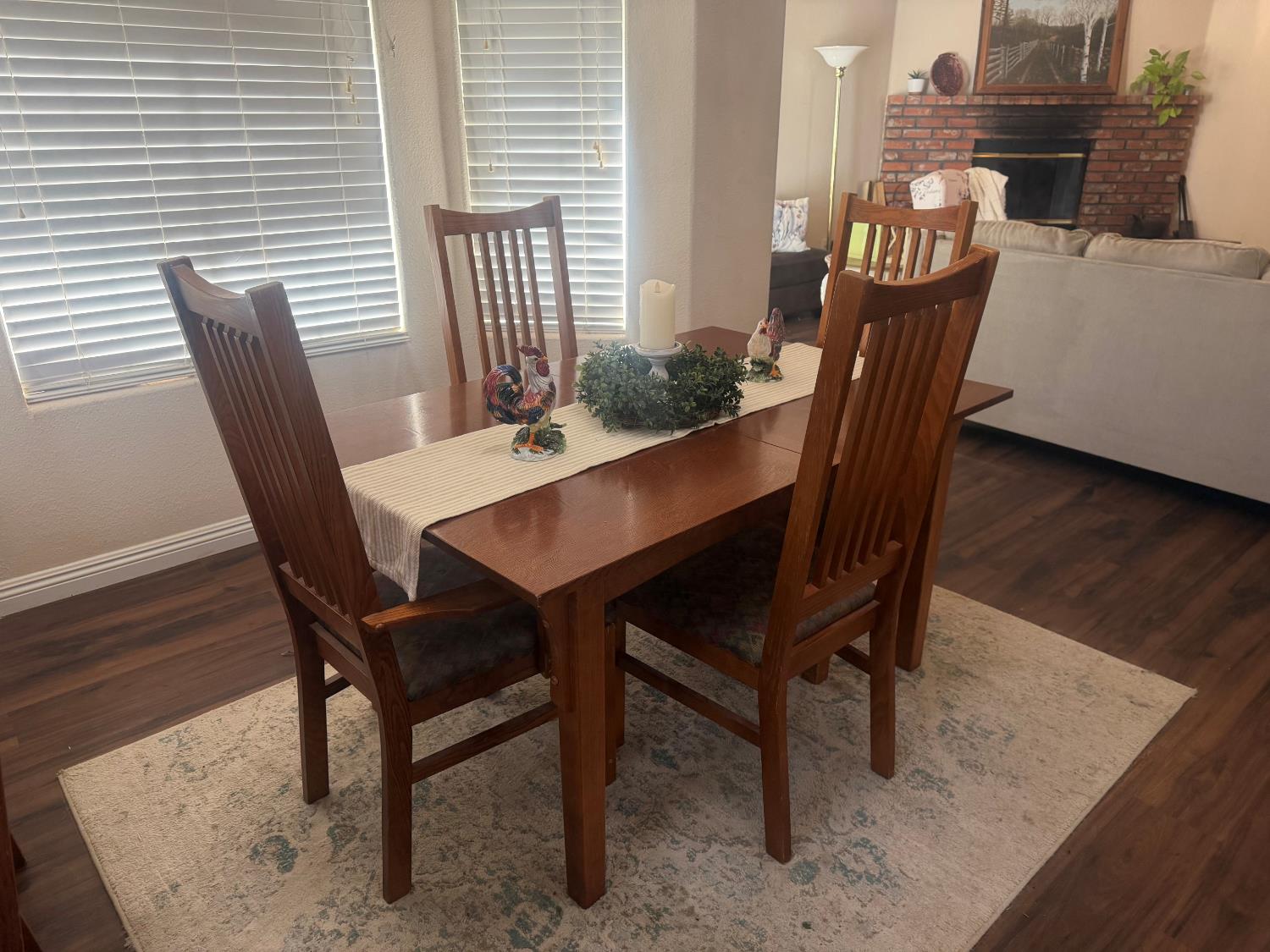 16638 Mark Road Madera, CA 93636 - Photo 6 of 22 a view of a dining room with furniture window and wooden floor