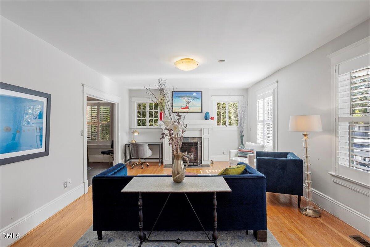 807 East Edenton Street Raleigh, NC 27601 - Photo 10 of 68 a view of a dining room with furniture window and wooden floor