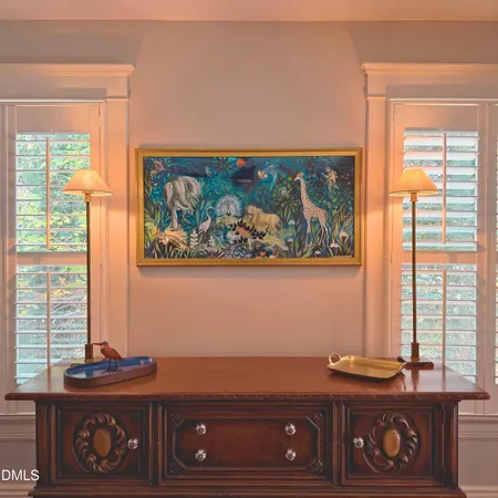 a view of a backyard with wooden floor and wooden fence