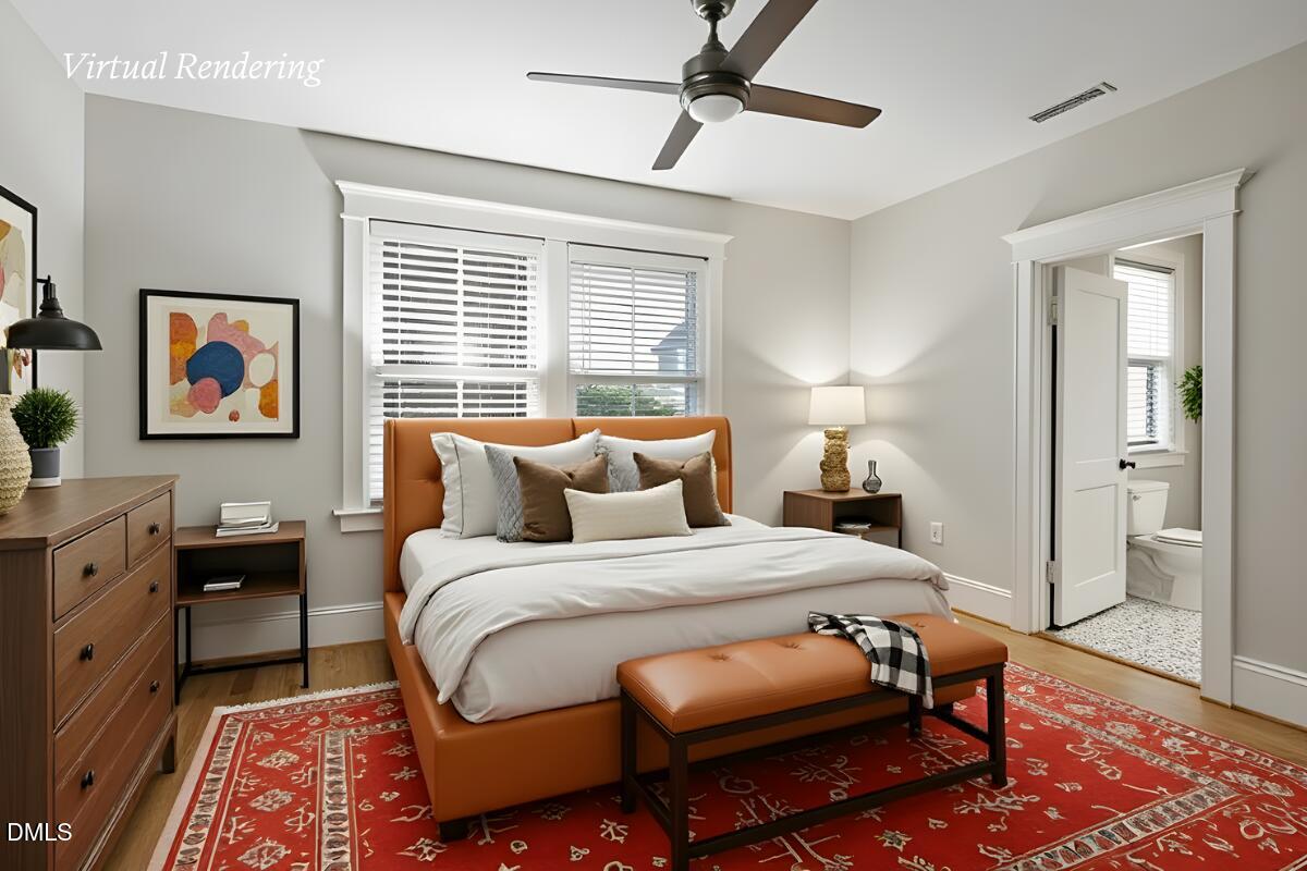 807 East Edenton Street Raleigh, NC 27601 - Photo 29 of 68 a bedroom with a bed and a dresser next to a window