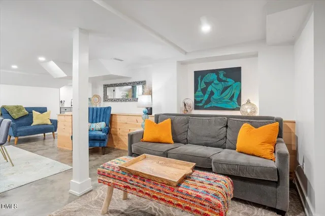 a living room with furniture and a couch