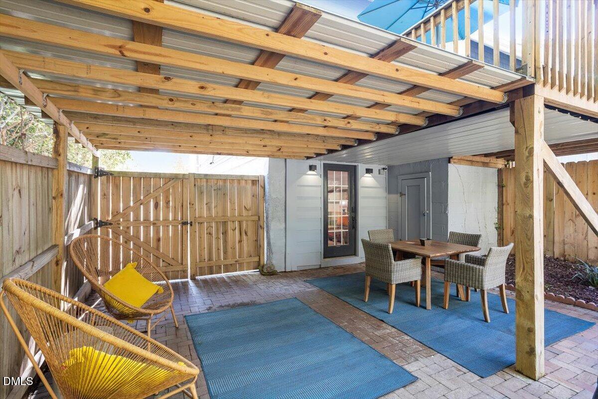 807 East Edenton Street Raleigh, NC 27601 - Photo 56 of 69 a view of an chairs and table in the patio