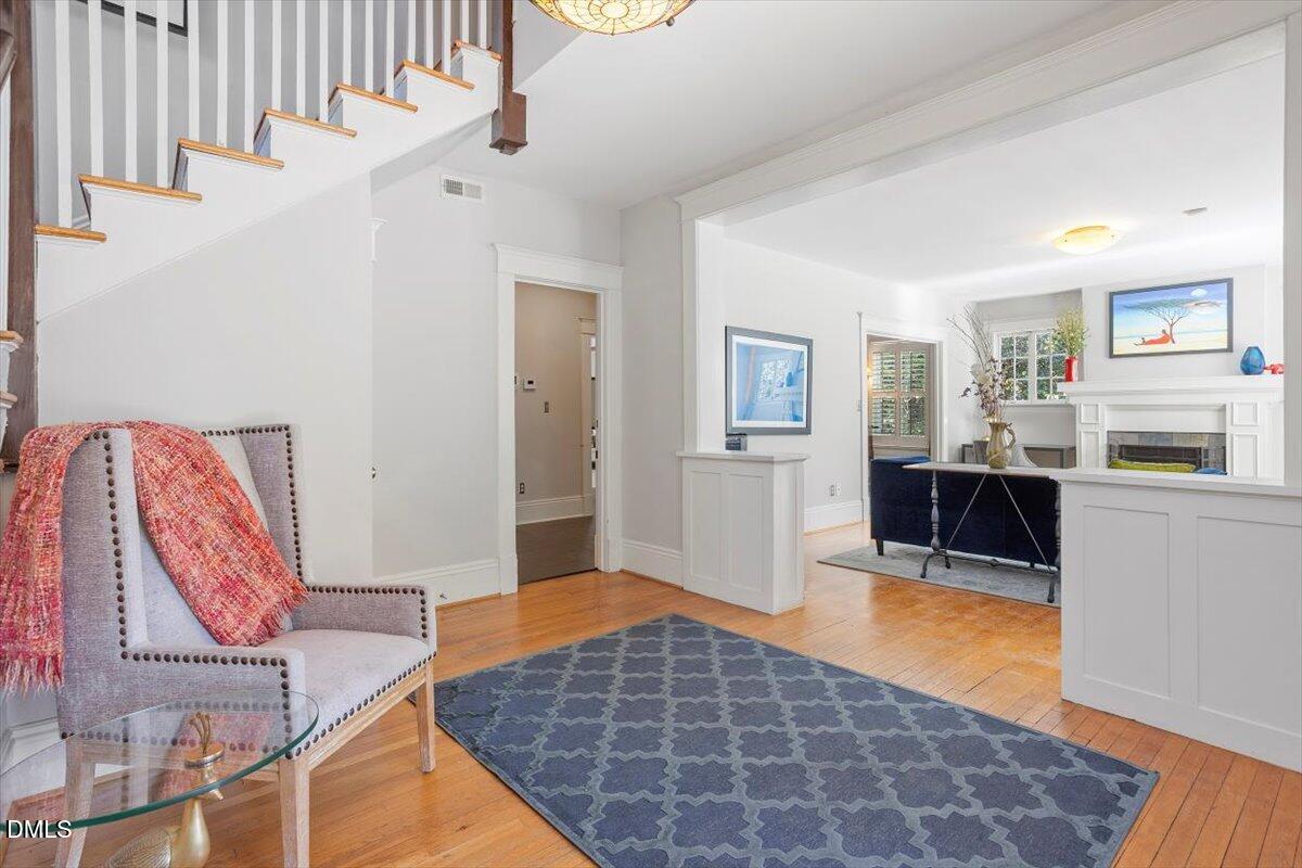 807 East Edenton Street Raleigh, NC 27601 - Photo 9 of 69 a living room with furniture and a wooden floor
