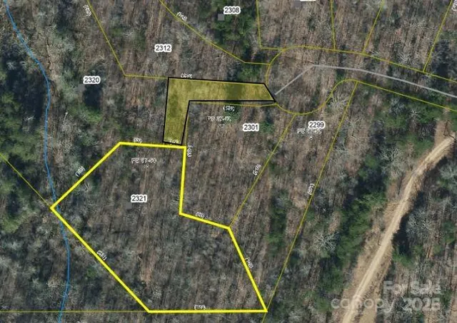 a front view of a house with parking space