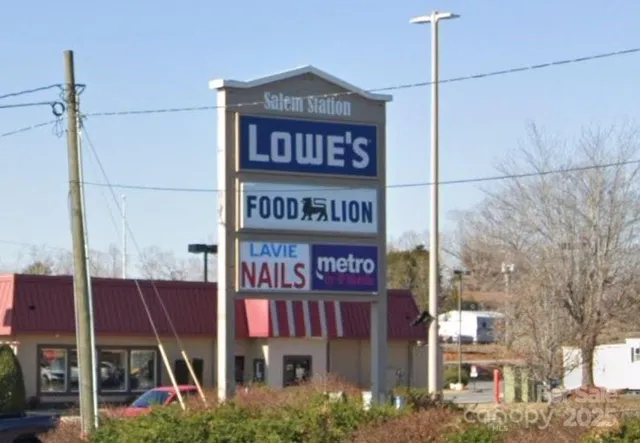 a view of a city street with cars
