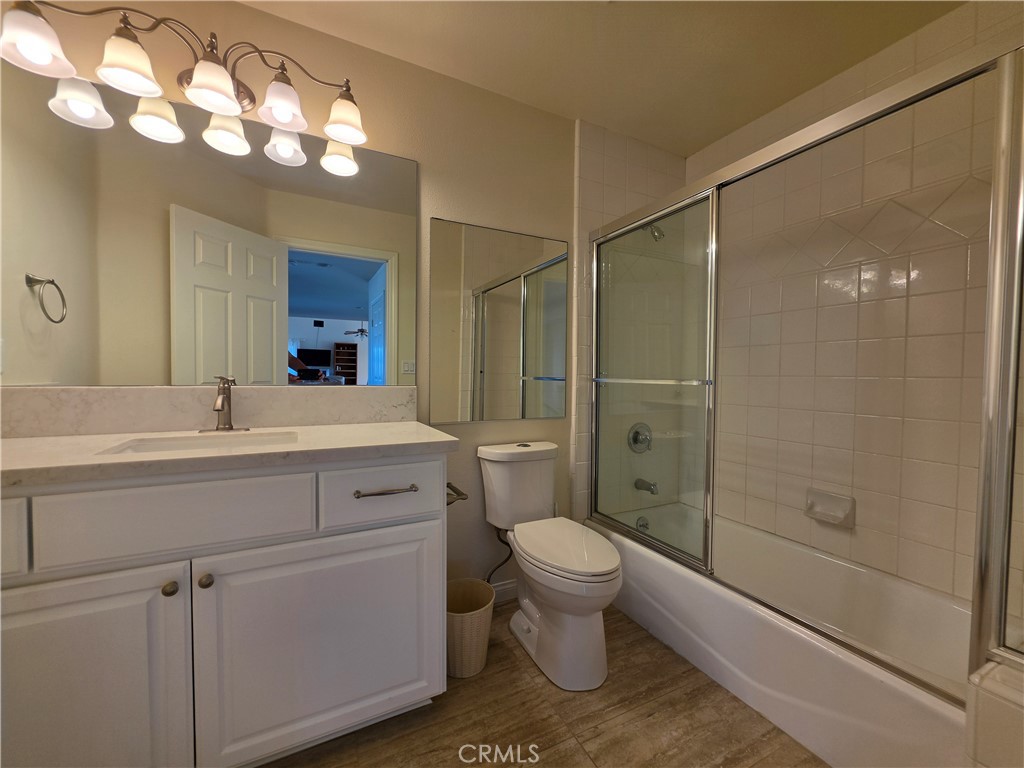 11541 Donovan Road Rossmoor, CA 90720 - Photo 27 of 113 upstairs hallway bathroom with quartz slab counters and tiled shower
