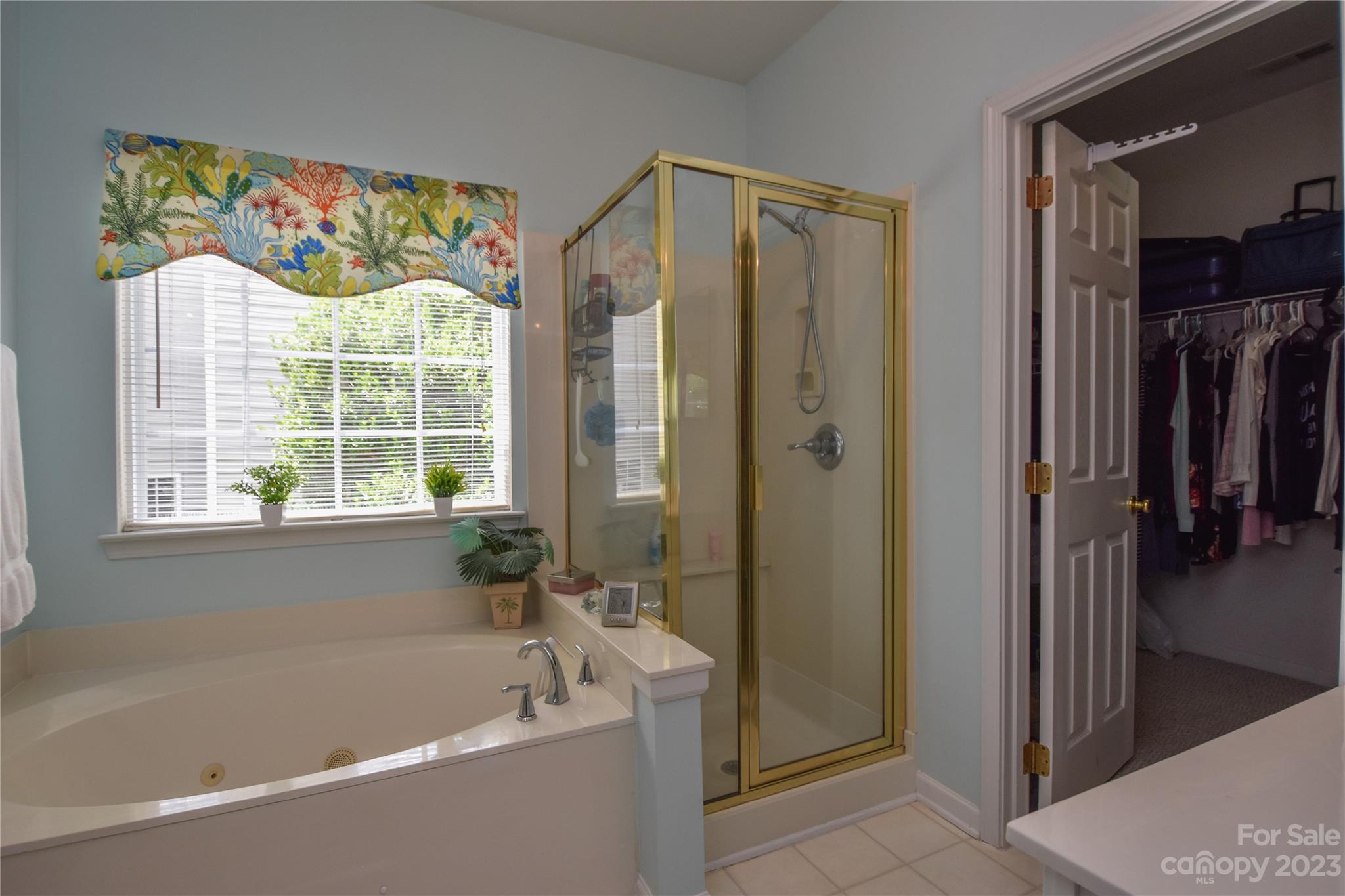 120 Comata Road Mooresville, NC 28117 - Photo 14 of 25 a bathroom with a bathtub and a shower
