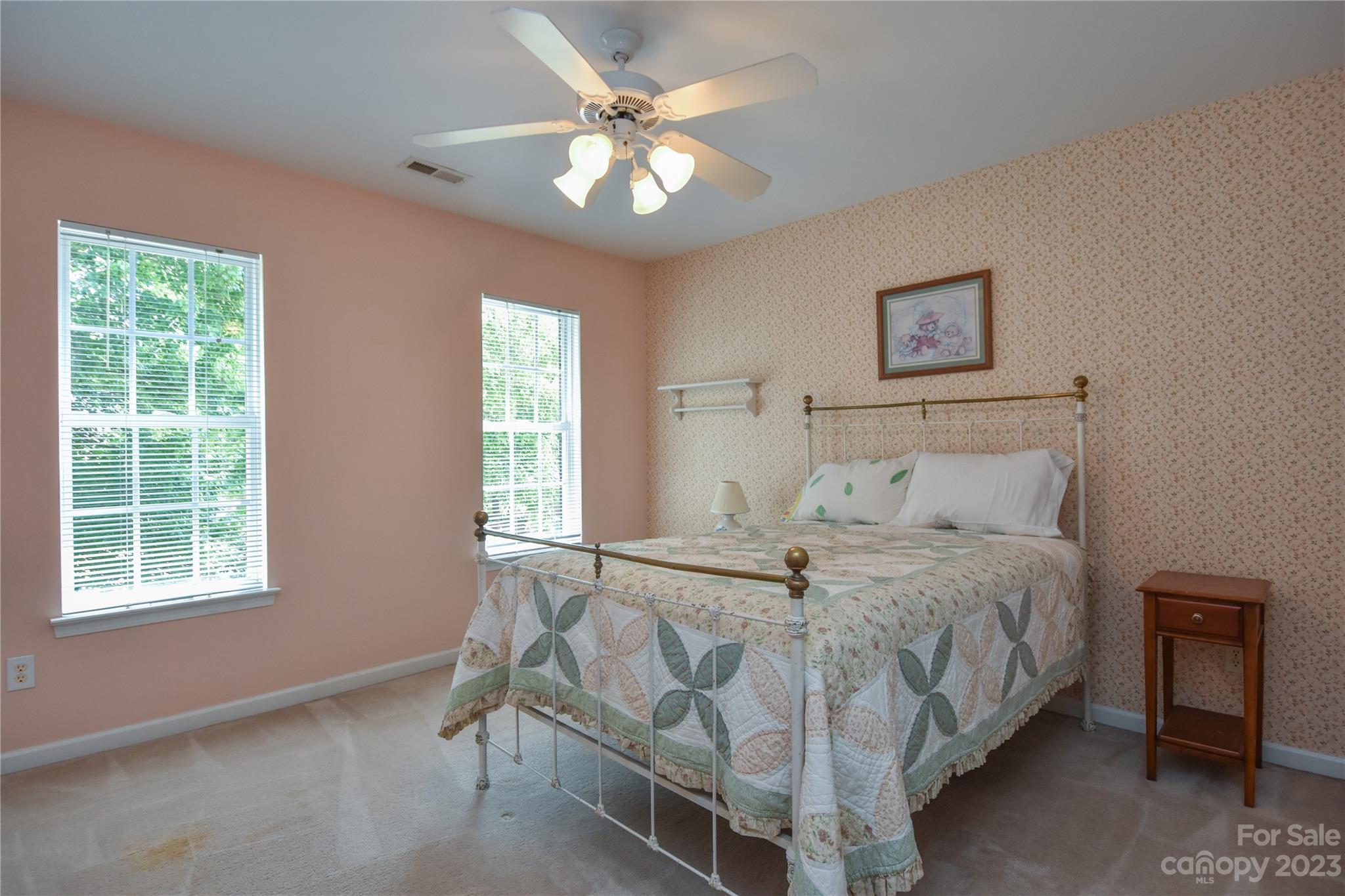 120 Comata Road Mooresville, NC 28117 - Photo 15 of 25 a bedroom with a bed and a window