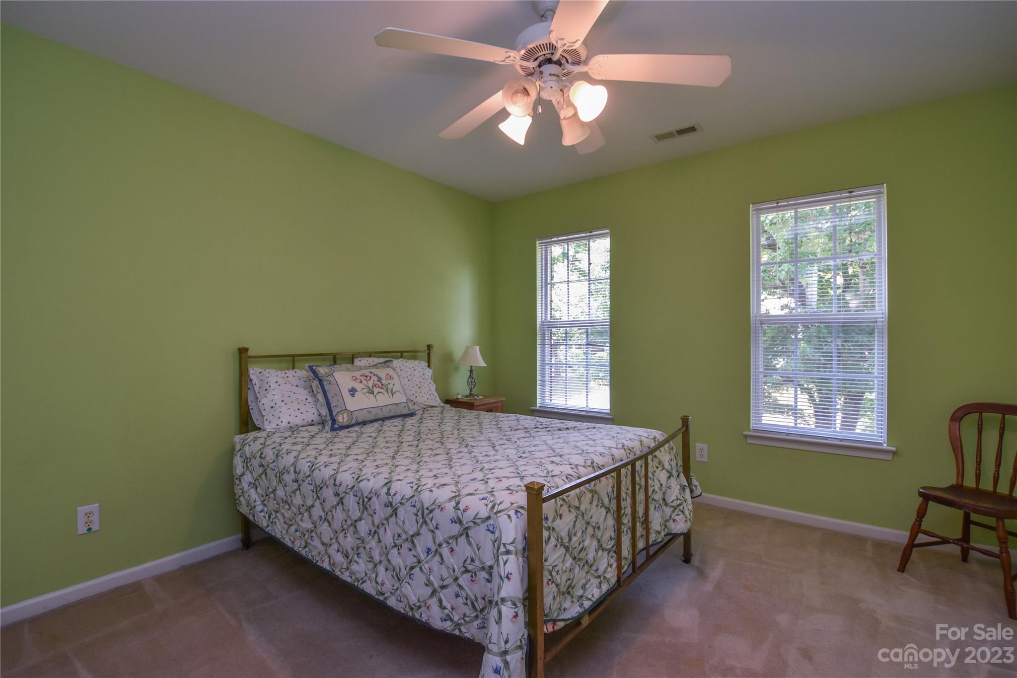 120 Comata Road Mooresville, NC 28117 - Photo 19 of 25 a bedroom with a bed and a window