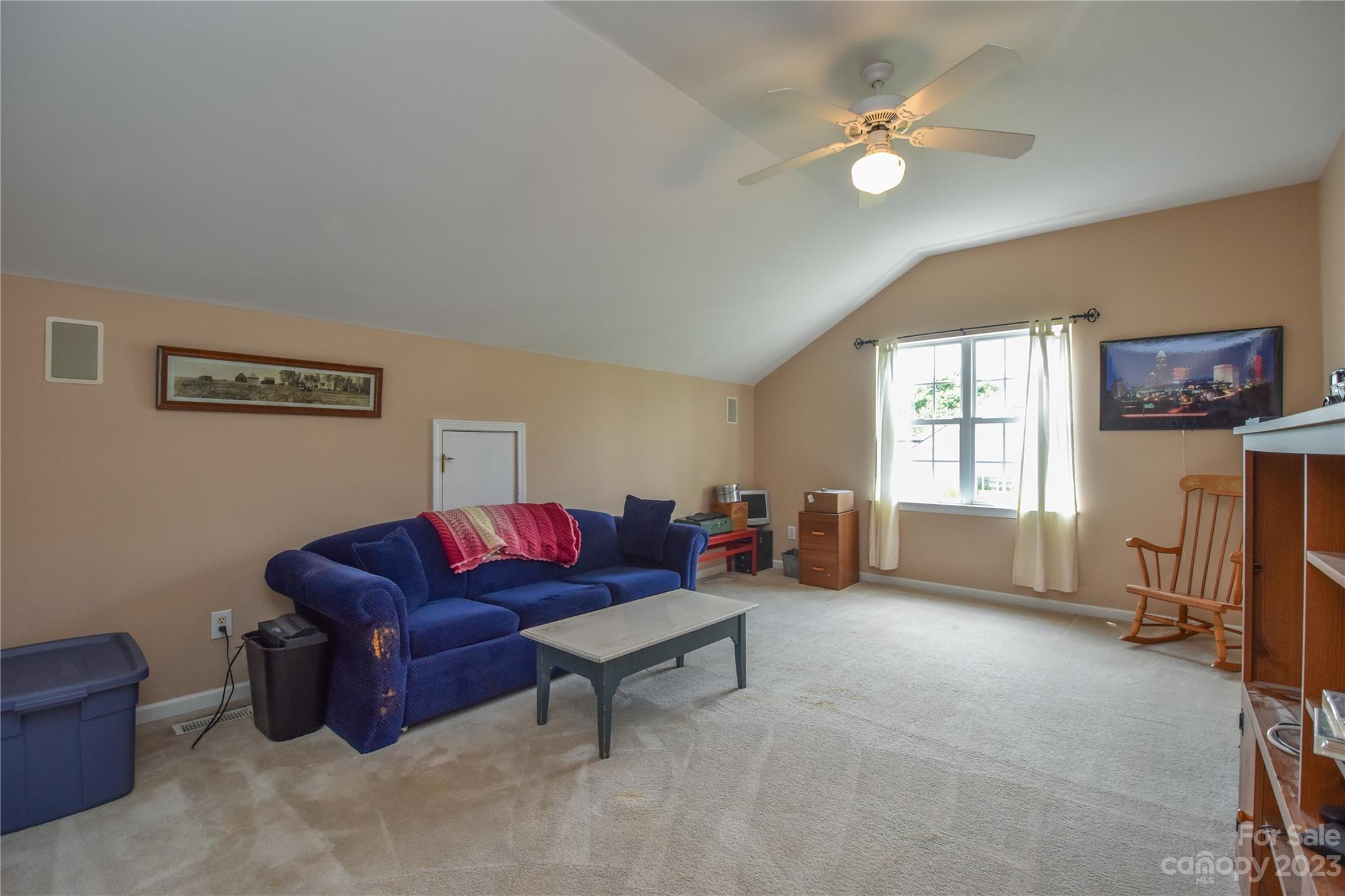 120 Comata Road Mooresville, NC 28117 - Photo 20 of 25 a living room with furniture and a window