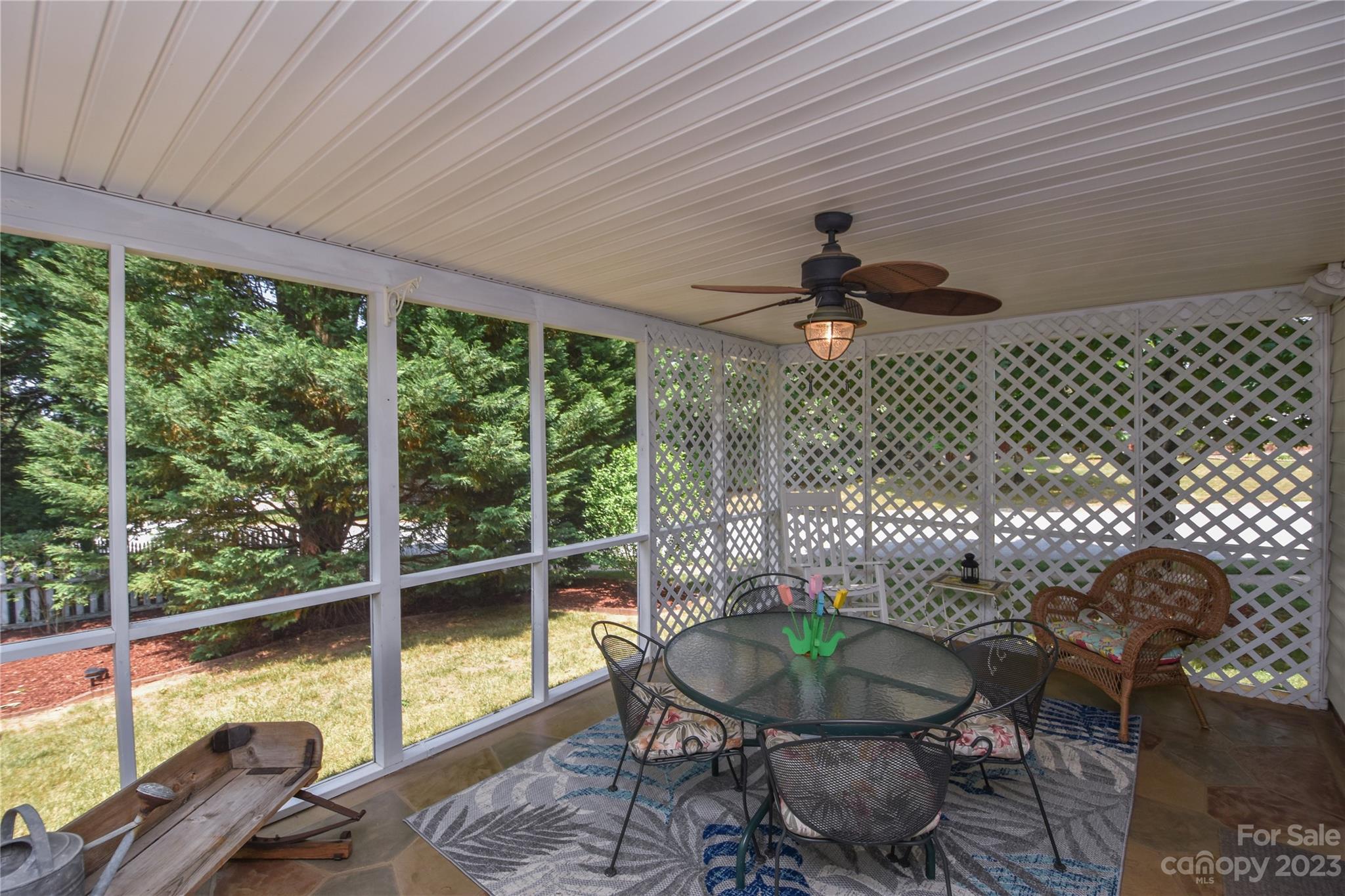 120 Comata Road Mooresville, NC 28117 - Photo 23 of 25 a living room filled with furniture and a floor to ceiling window