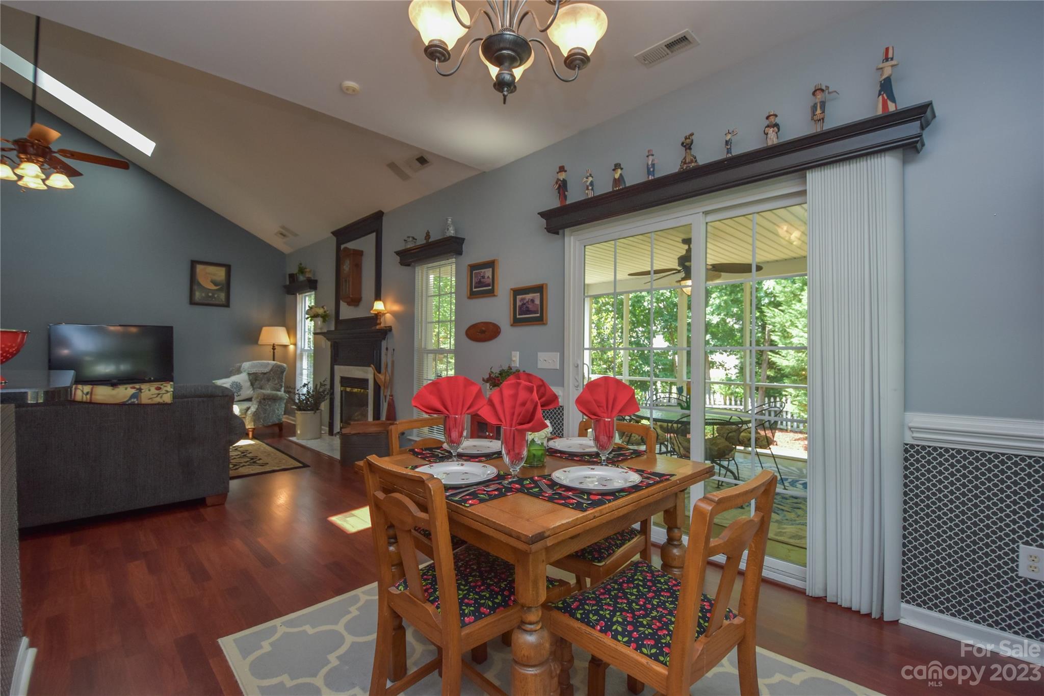 120 Comata Road Mooresville, NC 28117 - Photo 9 of 25 a view of a dining room with furniture window and wooden floor