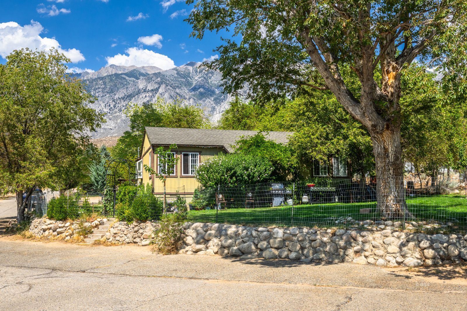 1600 Pine Creek Road Bishop, CA 93514 - Photo 11 of 34 a view of a house with a tree in front of it