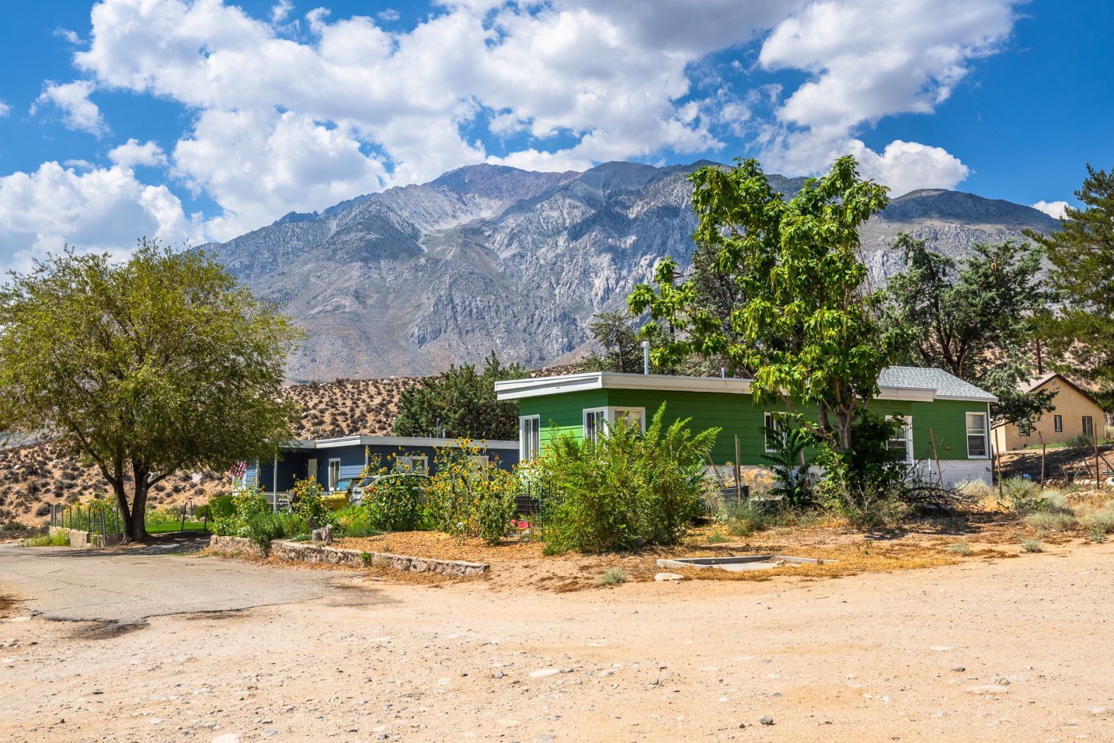 1600 Pine Creek Road Bishop, CA 93514 - Photo 12 of 34 a front view of a house with a yard